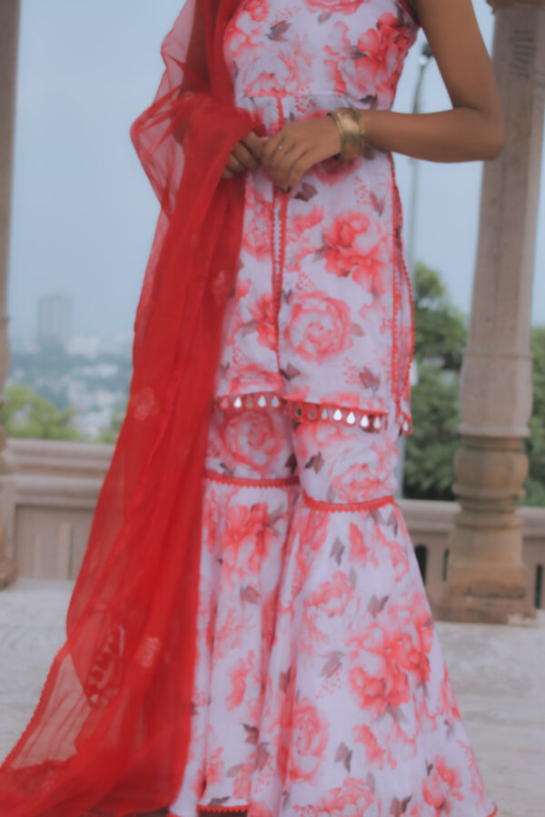 "GULMOHAR" Red floral sharara kurta set with intricate lace work - Image 3